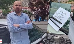 Otomobilin camına bırakılan not yavru kediyi kurtardı