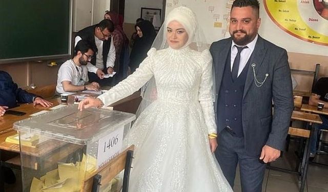 Damatlık ve gelinlikle oy kullanmaya gittiler