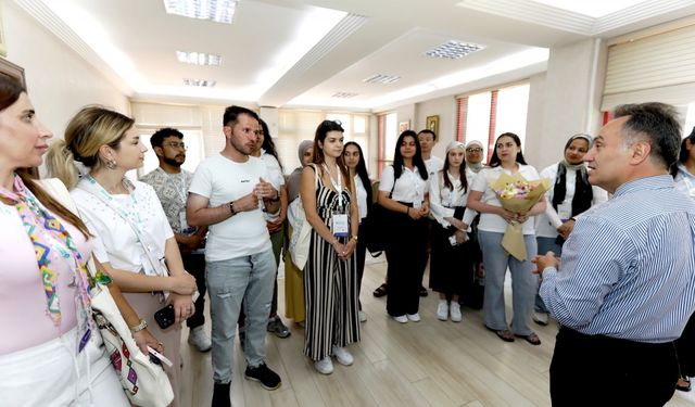 TOGÜ Rektörü Yılmaz'a TÖMER öğrencilerinden ziyaret